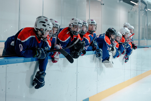 Youth Hockey Players on bench